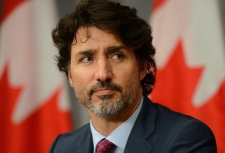 যে কারণে ক্ষমা চাইলেন জাস্টিন ট্রুডু